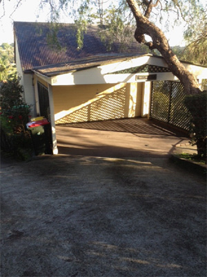 Top level garage with driveway and street access